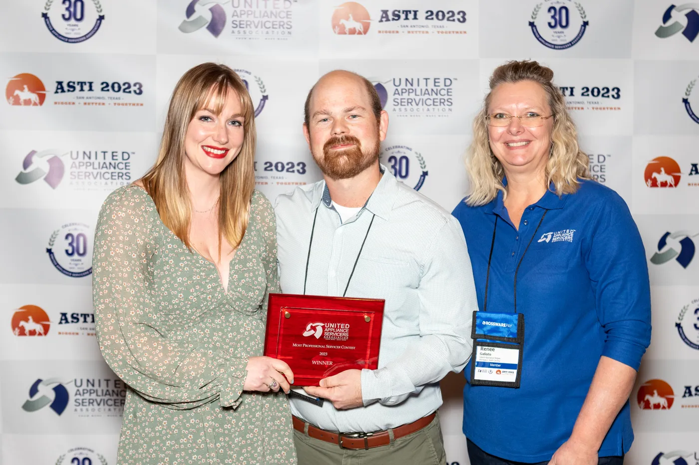 Justin Duby accepting the Most Professional Servicer Award at ASTI 2023 in San Antonio, Texas