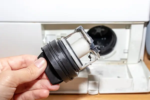 how do you fix a washing machine that won't drain