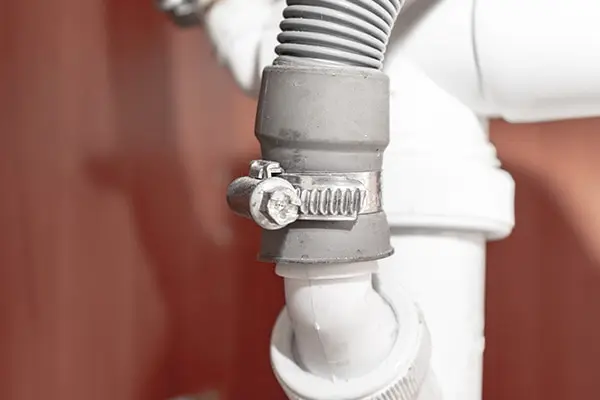 What is the most common reason dishwashers leak