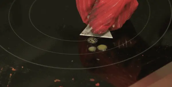 remove turnt on food from glass cooktop
