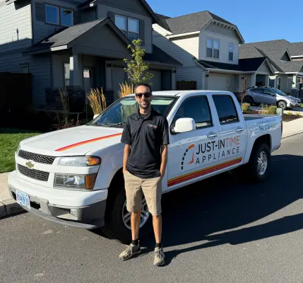 Justin with Just-in Time service truck in Bend neighborhood